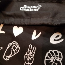 Load image into Gallery viewer, A closer look of the Disability Creations label.