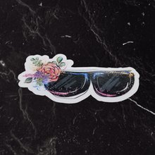 Load image into Gallery viewer, A Eyeglasses Sticker on top of a black marble table.