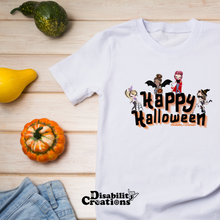 Load image into Gallery viewer, The Happy Halloween shirt next to jeans and small pumpkins..