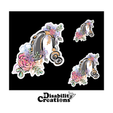 Load image into Gallery viewer, On a black surface, three stickers of different sizes, 2, 3, and 5 inches. The Disability Creations logo is on the bottom. 