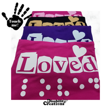 Load image into Gallery viewer, Four folded shirts lined up towards you, displaying the color options of the shirt and the shirt's design.