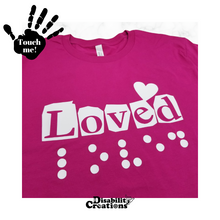 Load image into Gallery viewer, A folded berry shirt with white design. On the top left is a black hand. On the palm, it says, &quot;Touch me.&quot; The Disability Creations logo is at the bottom.
