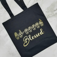 Load image into Gallery viewer, The Blessed Pull picture of the Tote Bag (ASL-Fingerspelling and English)