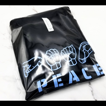 Load image into Gallery viewer, The Peace in ASL T-Shirt in a plastic bag
