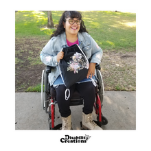 Load image into Gallery viewer, Nelly holding the drawstring bag on her lap.