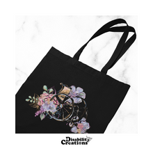 Load image into Gallery viewer, The Wheelchair with Flowers tote bag.