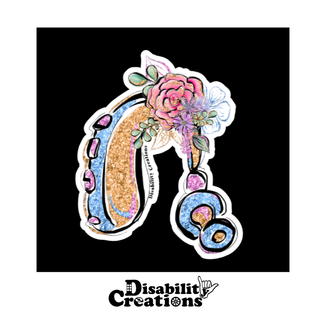 The Hearing Aid with Flowers on a black background sticker. The Disability Creations logo is on the bottom. ⁠ 