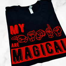Load image into Gallery viewer, A black t-shirt that says &quot;My Hands are Magical&quot; in red. Hands&quot; is in American Sign Language, fingerspelling. 

